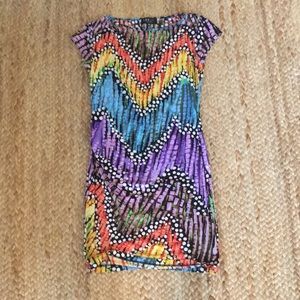 Stretchy mini dress, colorful and abstract.